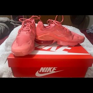 Excellent! Size 9 pink air max Nike shoes. Never worn. In perfect condition